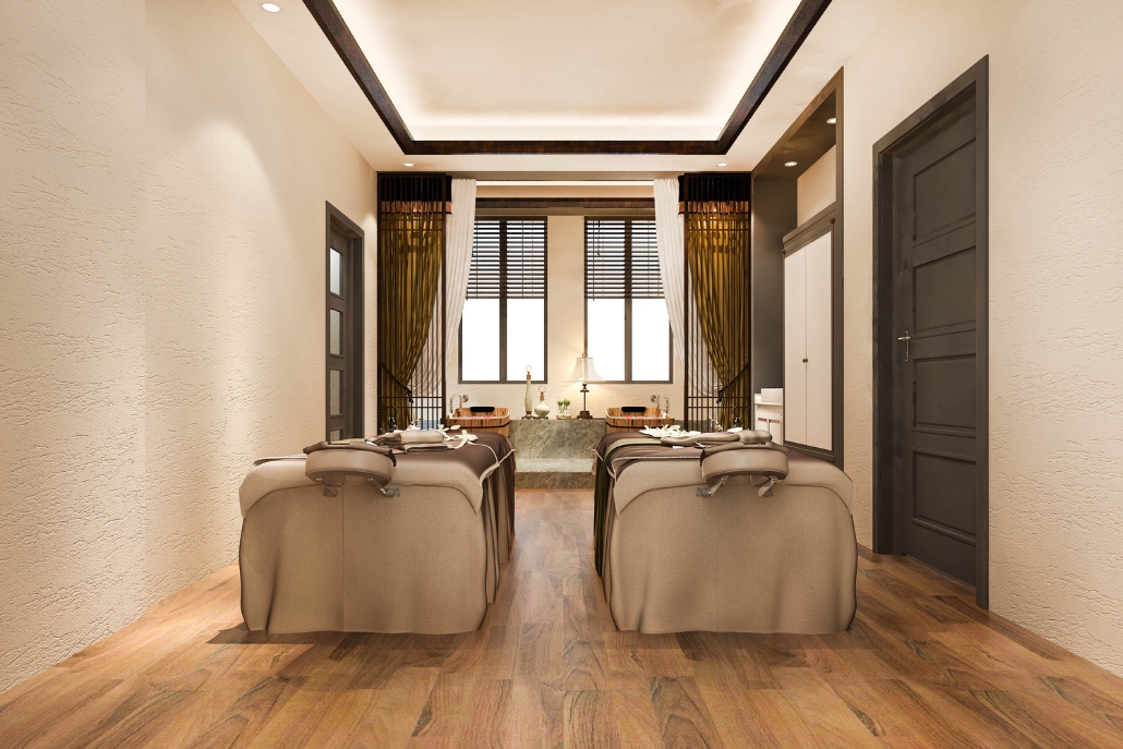 Tranquil room with spa bed and a table, representing the inviting atmosphere of Yarrow Spa at Hotel Jerome, Aspen.