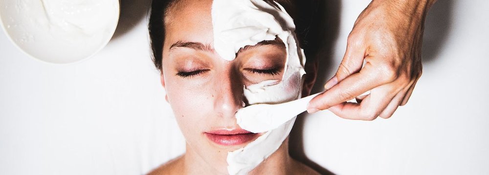 A woman receives a facial mask treatment at the Best Spa in Aspen, enjoying a moment of relaxation.