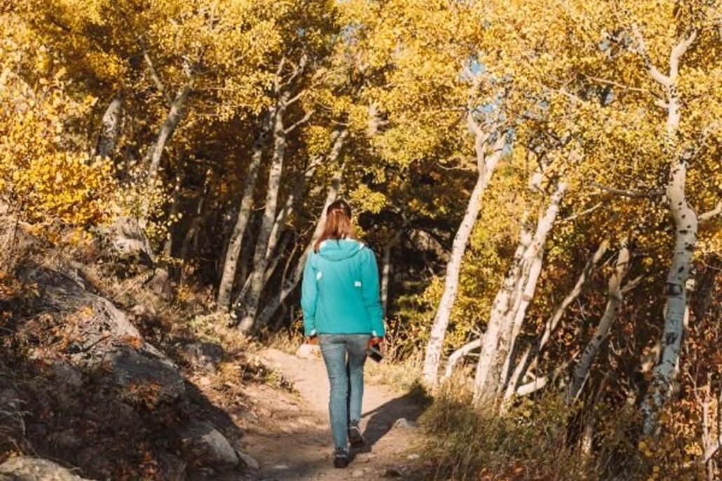 A tourist is hiking the trails in Aspen, Colorado