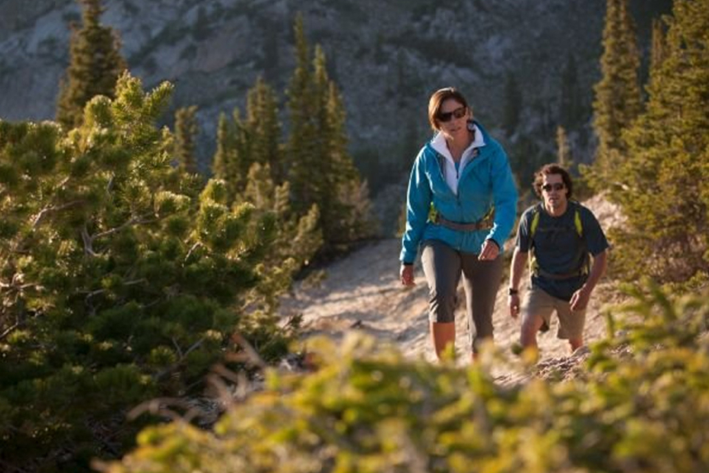 The couple hiking in Aspen mountain with beautiful landscape