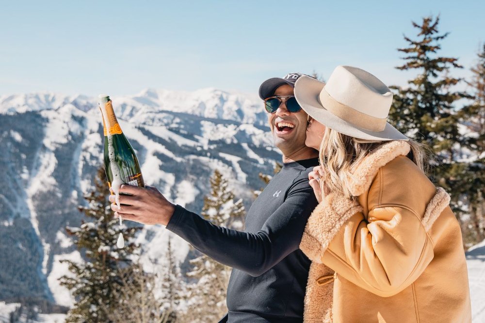 A happy couple booked a luxury hotel through Aspen Luxury Concierge