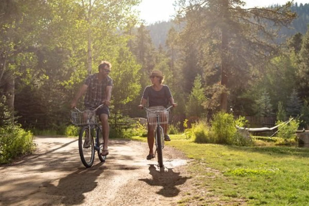 A couple of friends use bicycles to reduce distances