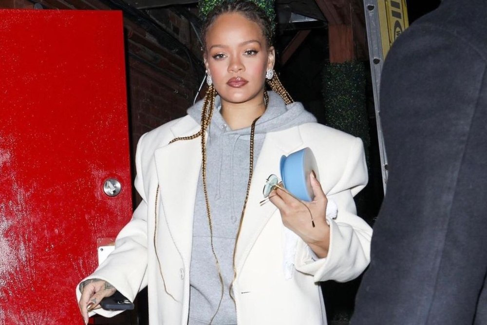 Rihanna spotted in Aspen, showcasing her stylish outfit and confident demeanor.