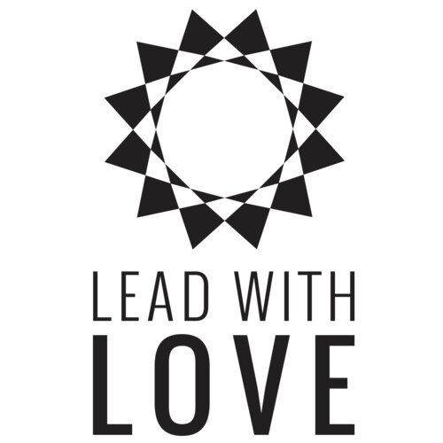 Logo featuring the phrase "Lead with Love" in a stylized font, symbolizing compassion and unity.