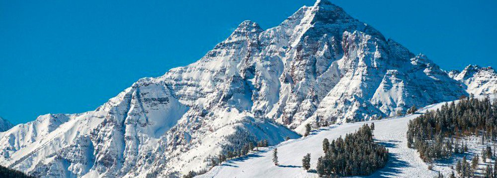 The majestic mountain, showcasing Aspen Altitude's winter beauty