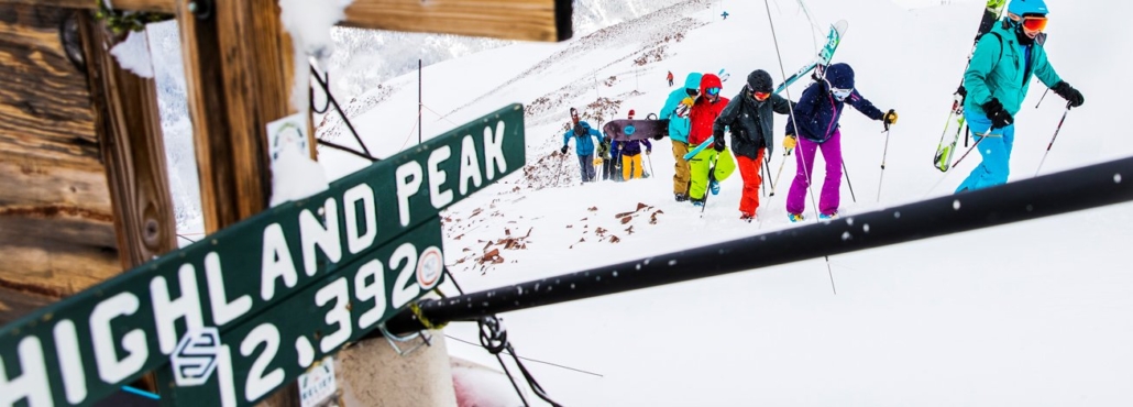 A group of skier climbing on snowy mountain, highlighting a picturesque winter scene.