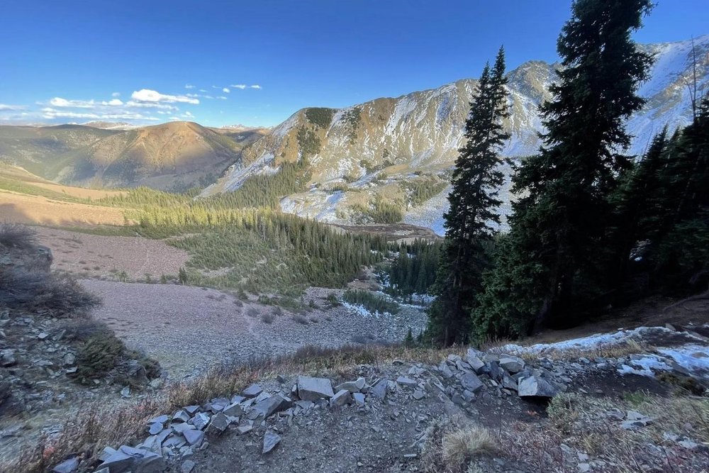 The Cathedral Lake Trail with rocky pathway and stunning view of a landscape