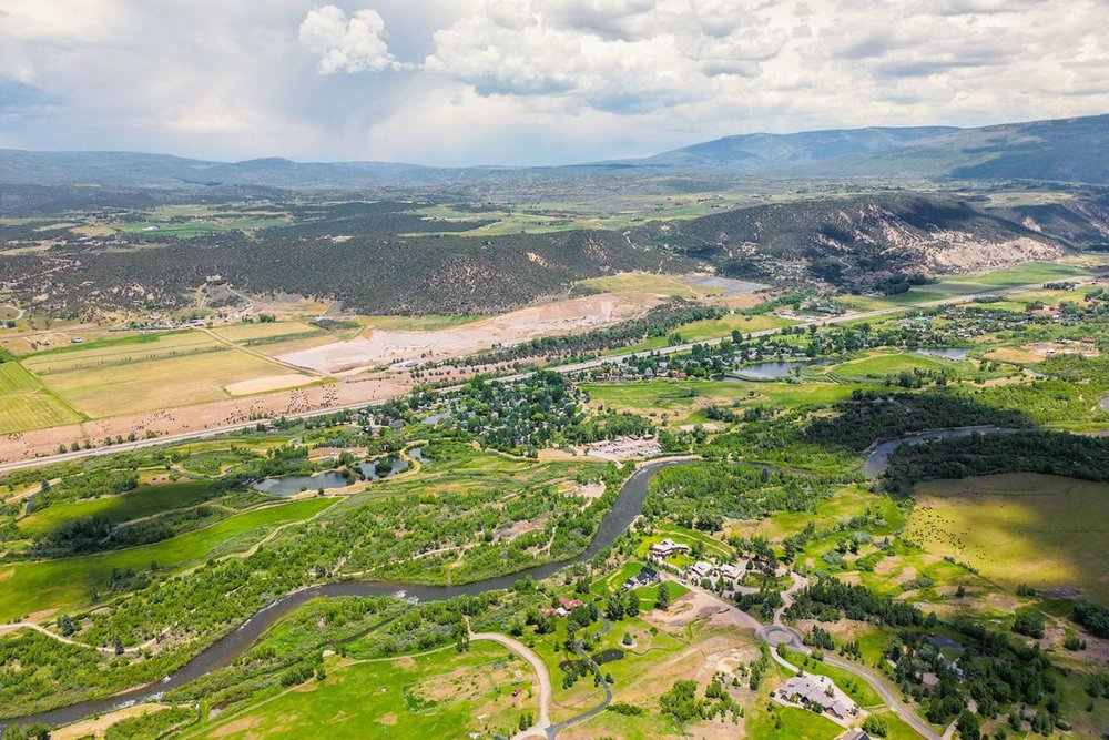 Expansive aerial view of Aspen's lush landscapes