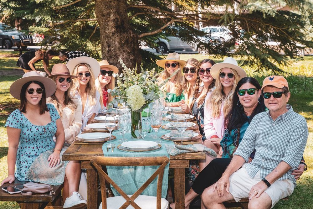 The guests of ALC are having a luxury picnic in Aspen in September