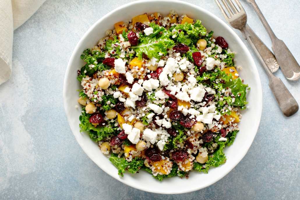 A fresh salad with feta cheese, cranberries, and nuts, presented at Spring Cafe, part of Aspen Coffee Shops.