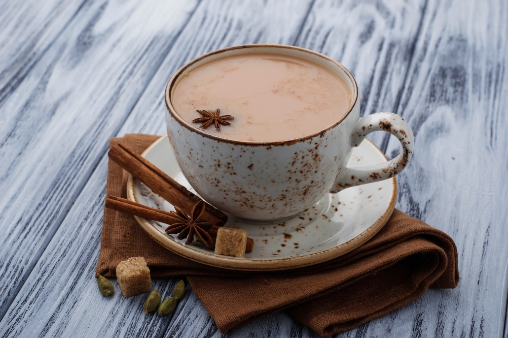 Dirty Chai Tea Latte in a cup on a wooden table, from Swedish Hill Café at Aspen Art Museum.