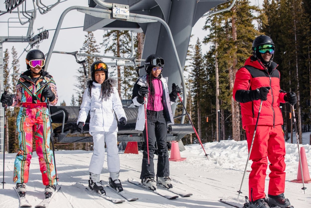  A group of skiers navigating the slopes in Aspen during November, showcasing winter sports and camaraderie.