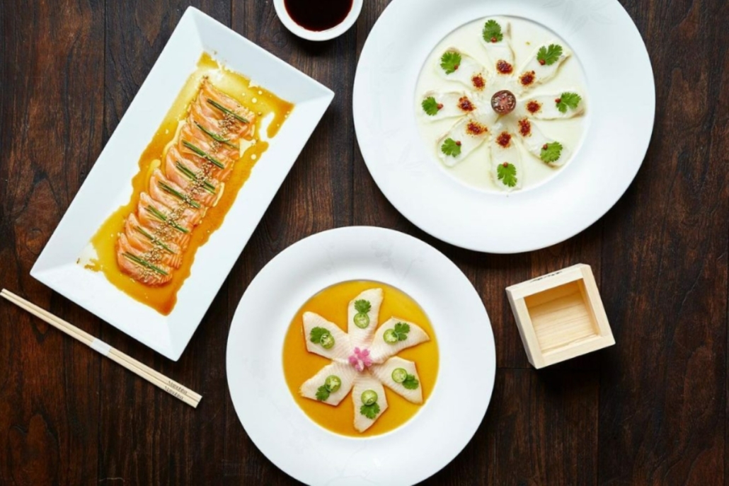 Three elegantly arranged plates of sushi food serves by Matsuhisa Aspen