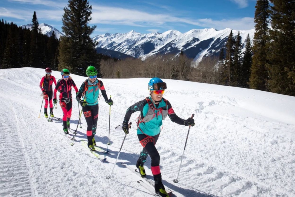 Four skiers navigate a snowy slope during the Audi Power of Four Ski Mountaineering Race in Aspen, February.