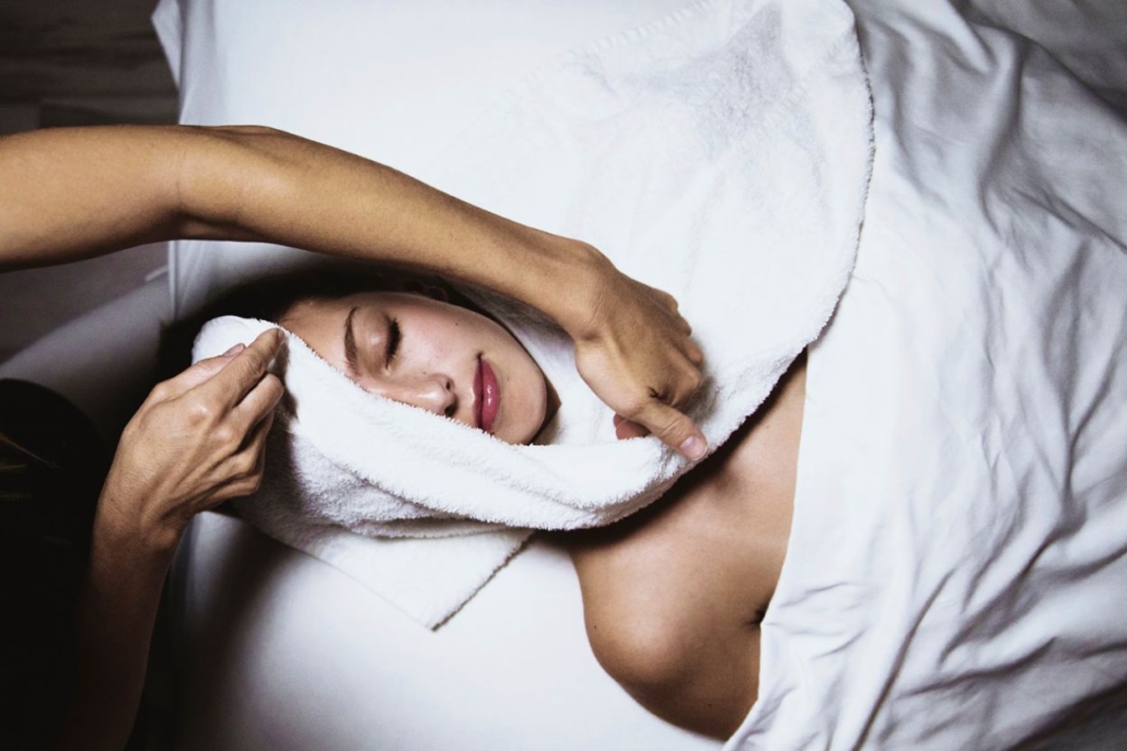 A woman receiving a relaxing back massage during a luxurious spa day for an Aspen bachelorette celebration.