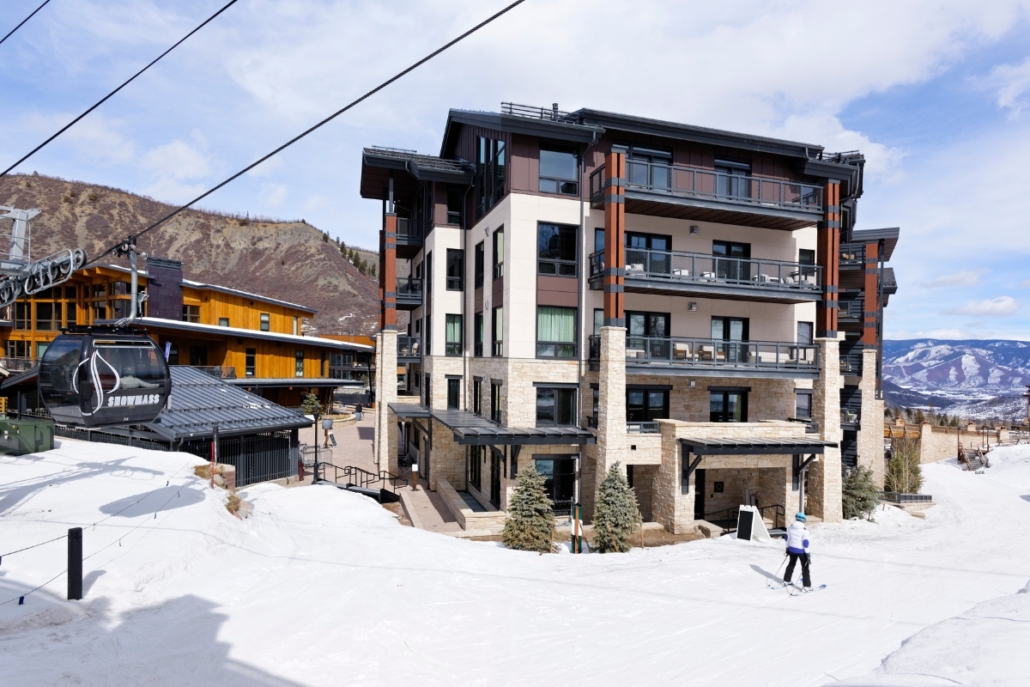 Limelight Alpine Retreat condo with ski-in/ski-out access beside Snowmass gondola in winter.