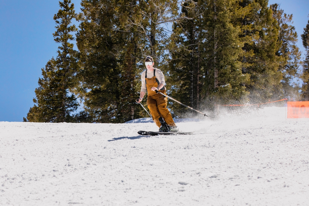 A skier descends a snowy slope at the X Games Concerts and Competitions, showcasing winter sports excitement.