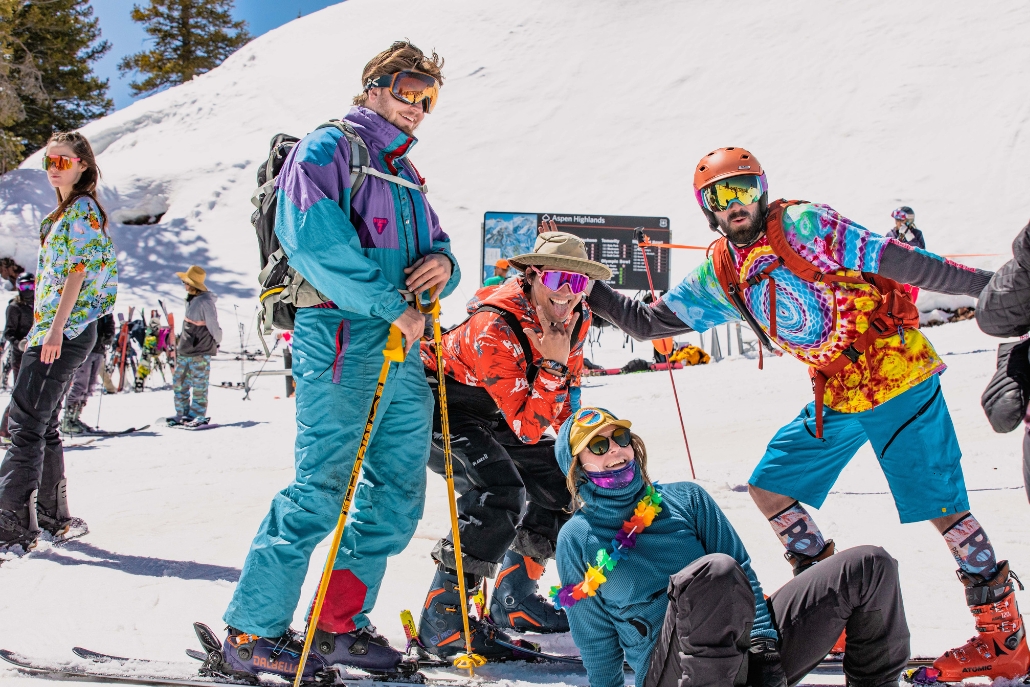 A cheerful group posing for a picture during Aspen Gay Ski Week, highlighting friendship and festive atmosphere.