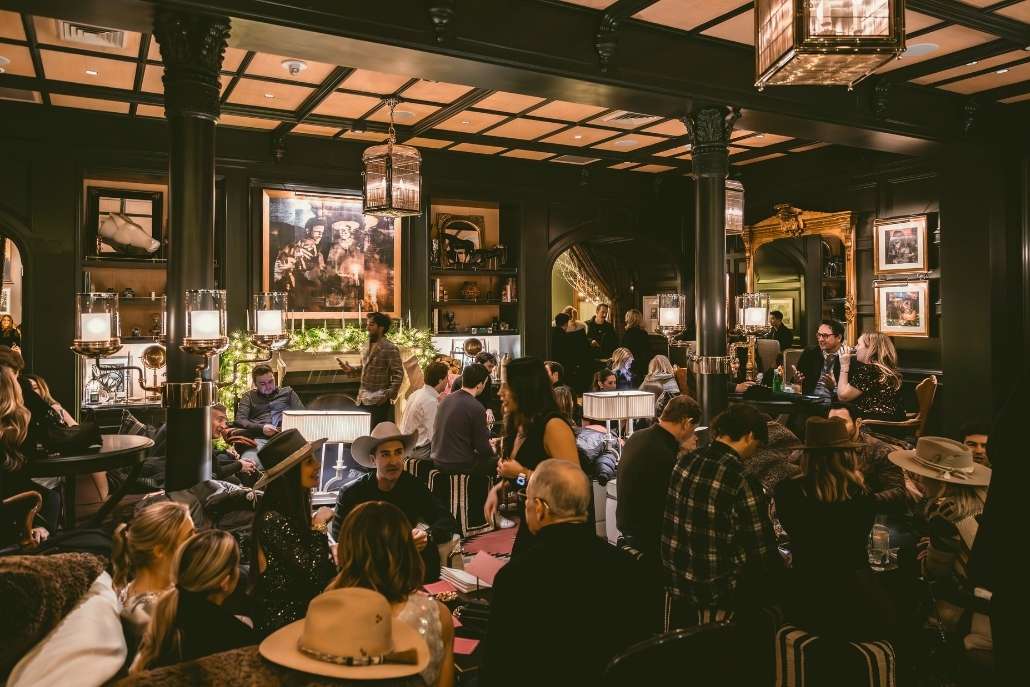 Elegant Hotel Jerome living room, prepared for drinks and dinner at Angelo's on Aspen Itinerary Day 1.