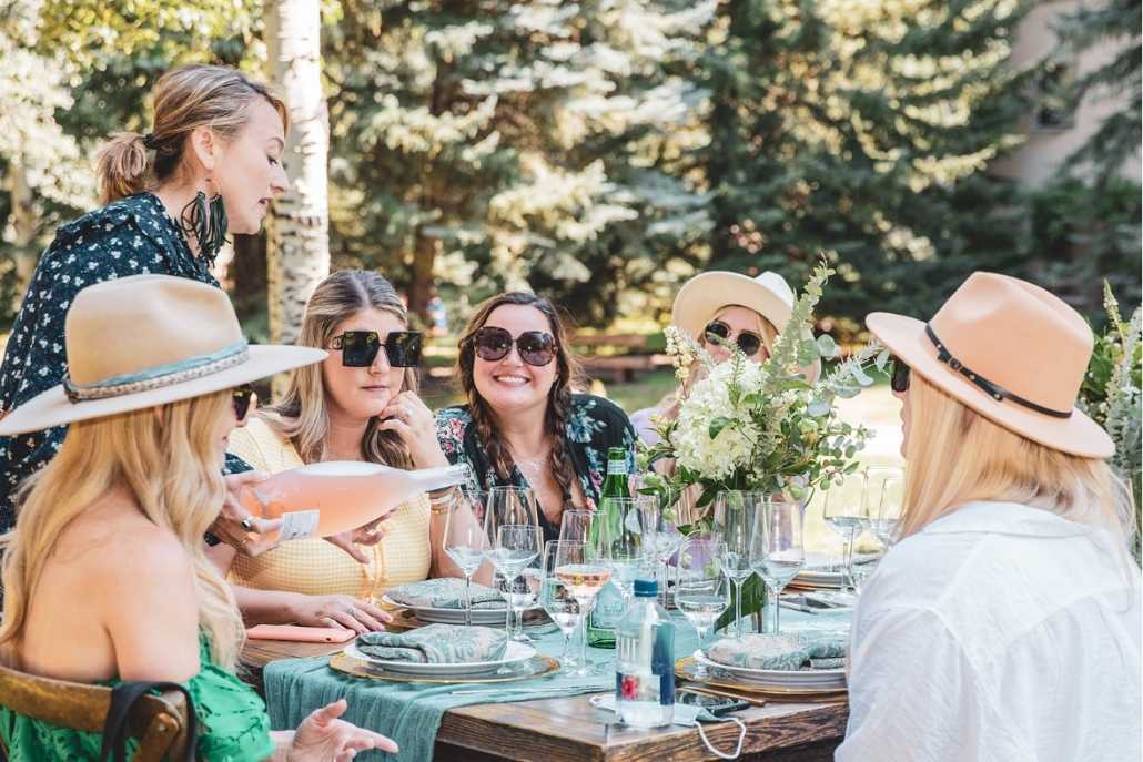 Luxury outdoor brunch gathering in Aspen for a stylish birthday group celebration