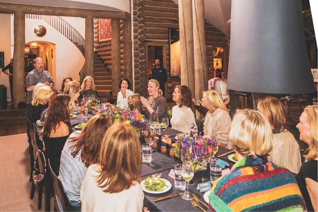 Private luxury dinner party in an Aspen lodge with curated dining and elegant ambiance