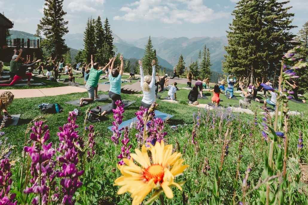 Scenic outdoor yoga session with panoramic Aspen mountain views during an afternoon itinerary