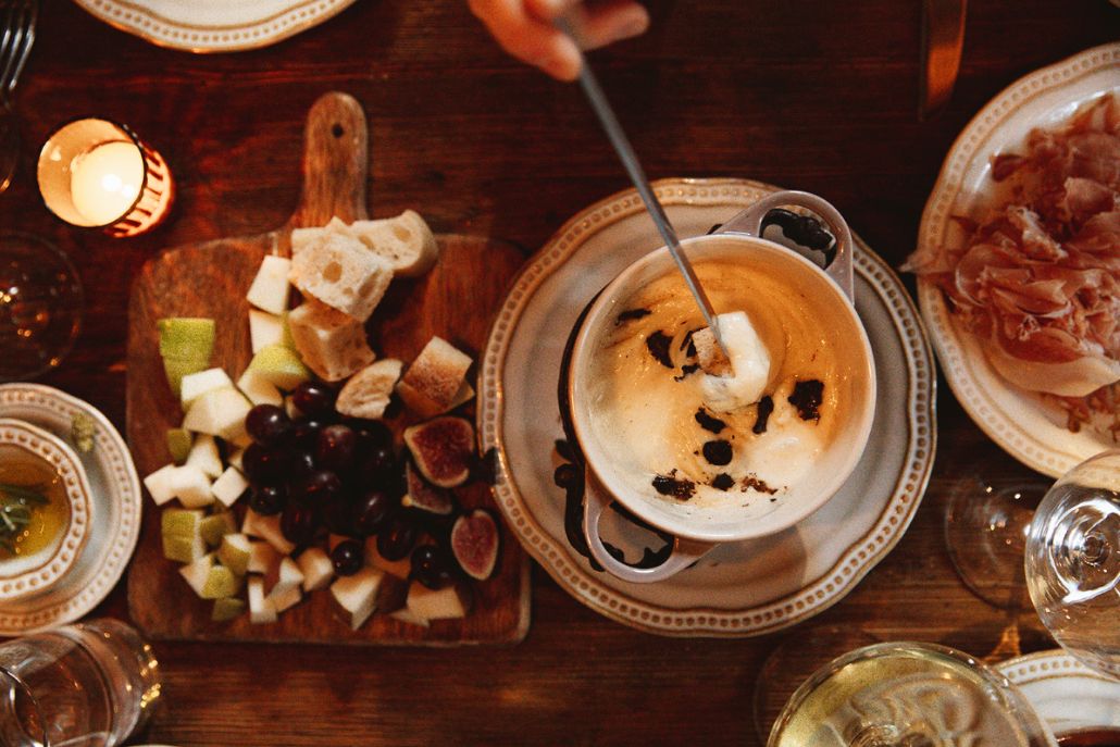 Luxury fondue dinner with artisan cheeses and charcuterie at French Alpine Bistro in Aspen