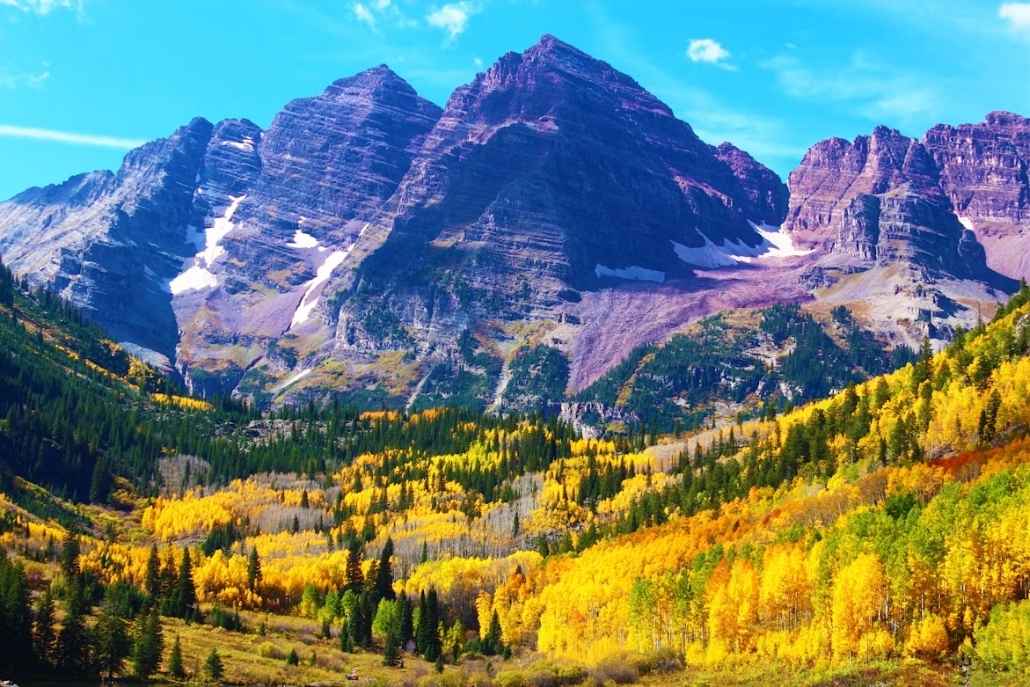 Fall foliage at Aspen’s Maroon Bells with golden aspens and rugged mountain peaks
