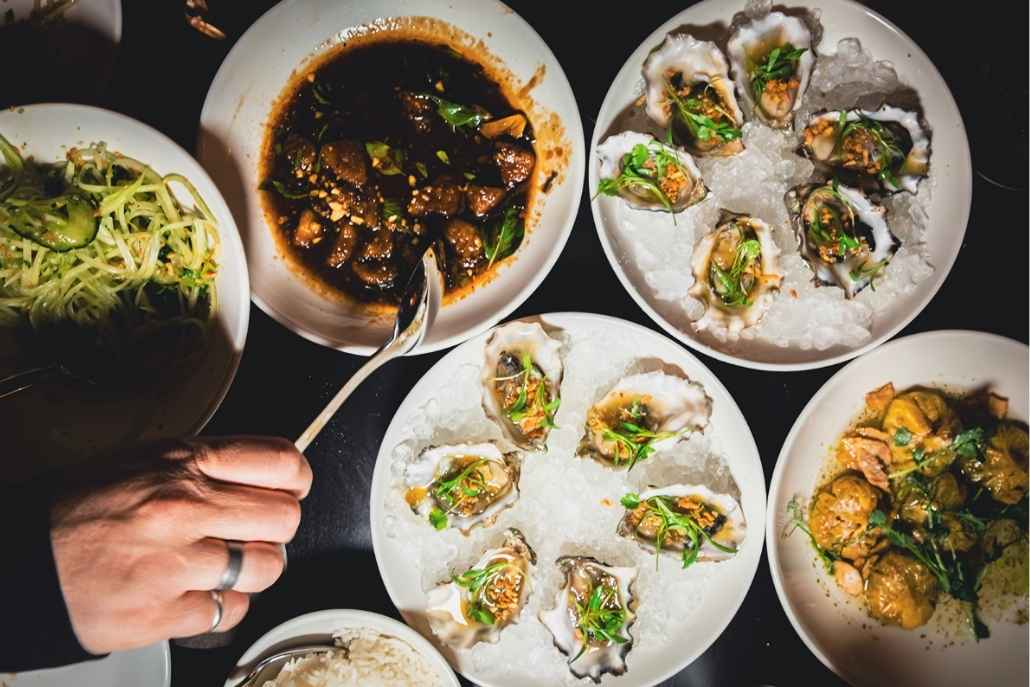 Private-chef dinner featuring oysters and gourmet dishes at an Aspen luxury residence